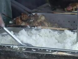 (HD1080i) Stirring & Serving Steamed White Rice (into Polystyrene Container) Stock Footage