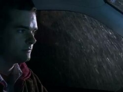 CU Shot of Man driving car in rain, Looking despondent / New York, United States Stock Footage