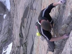 MS ZI Shot of male climber climbing rock with placing camalot in rock / Estes Park, Colorado, United States Stock Footage