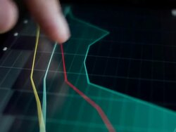 Touching stock market graph. Stock Footage