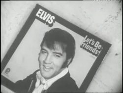 A man looks through 1970s albums on display in a record store. News Clip