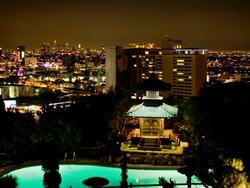 T/L, WS, HA, Japanese garden and swimming pool at night, Hollywood, Los Angeles, California, USA Stock Footage