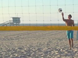 Man playing beach volleyball. - Slow Motion - filmed at 240 fps Stock Footage