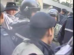 Police continue to take protesters away after sit-in Instructional Video