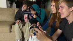 Joyful Teens Play with Video Game Stock Footage