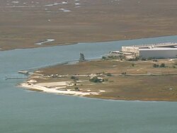 WS AERIAL View of landscape near river and jetty over river / South Carolina, United States Stock Footage