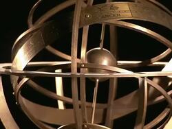 Rings surround the central orb in an armillary sphere. Stock Footage