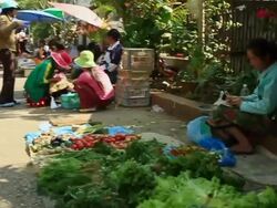 MS POV SLO MO Shot of street market / Luang Prabang, Laos Stock Footage