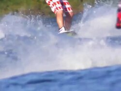 SLO MO Cable wakeboarders on lake Stock Footage