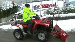 Snow clearing and children playing in Glossop News Clip