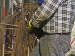 Worker Tying the Rebar on Constrution Site CU Stock Footage