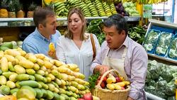 Couple grocery shopping at the market Stock Footage