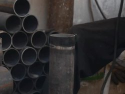 Man welding and using machinery in Bomb factory News Clip