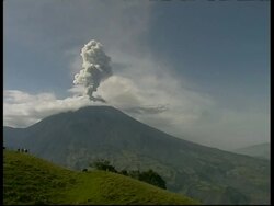 WA grey smoke and ash cloud rising quickly upwards from crater, Mount Tunguragua, Ecuador Stock Footage