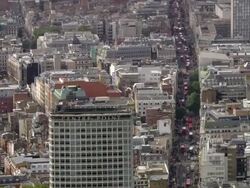 Aerial wide shot zoom in Centre Point building and view up Oxford Street / London, England Stock Footage