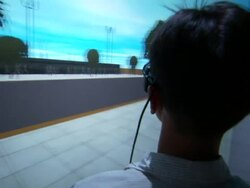 A young man tests  a simulated 3D environment. Stock Footage