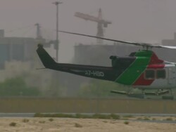 MS PAN TS Shot of helicopter taking off from airport / Qatar Stock Footage