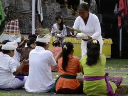 MS Priest performing Hindu ceremony with worshipers in Pura Dalem Puri temple / Ubud, Bali, Indonesia Stock Footage