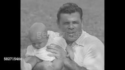 Boxer Max Schmeling with manager Joe Jacobs; opponent Mickey Walker and family News Clip