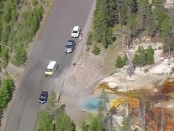 WS AERIAL DS Shot over people with their cars at White Dome Geyser / Wyoming, United States Stock Footage