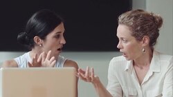 Businesswomen brainstorming at laptop Stock Footage