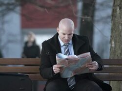 HD: Businessman Looking At Map Stock Footage