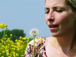 Girl%252Bblowing%252Bblowball Stock Footage