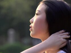 side face of Asian girl Stock Footage