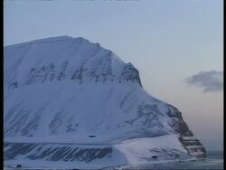 WA snow covered mountain with water in foreground at sunset, edited sequence, Arctic Stock Footage