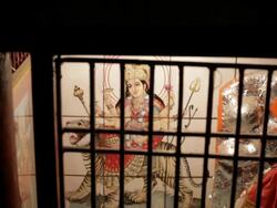 MS Painting of Hindu God behind window grill / India Stock Footage