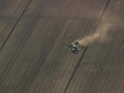 MS AERIAL ZO Shot of tractor on field / North Carolina, United States Stock Footage