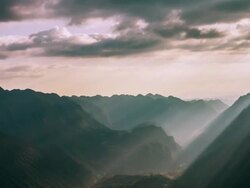 Time-lapse of clouds in the mountains Stock Footage