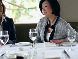 TU PAN Three businesswomen sitting at table in restaurant in meeting/Washington, USA Stock Footage