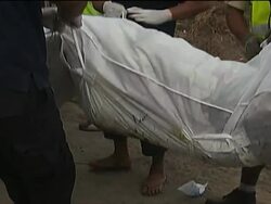 Aftermath and clean-up following deadly tsunami, body recovered News Clip