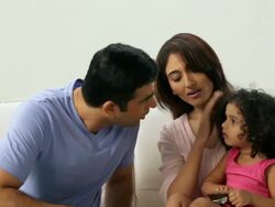 Man feeding chocolate to his daughter  Stock Footage