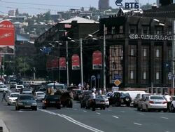 MS Traffic moving on road in city / Yerevan, Armenia Stock Footage