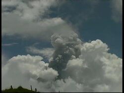 MS bands of grey cloud obscuring part of column of volcanic ash and smoke, Mount Tunguragua, Ecuador Stock Footage