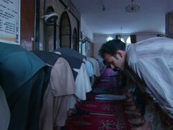 MS TS Men praying  together at  mosque AUDIO / Kabul, Kabul, Afghanistan Stock Footage