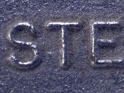 "STEEL" shown in raised lettering on metal surface. Stock Footage