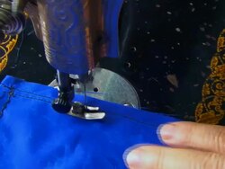 Hands at Work on Old Sewing Machine Stock Footage