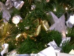 Christmas tree, nicely wrapped gift boxes with bow. Holiday season. Stock Footage