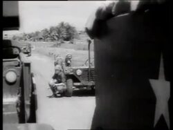 B/W 1960's 2 soldiers sitting in off-road vehicle / Vietnam / SOUND Stock Footage