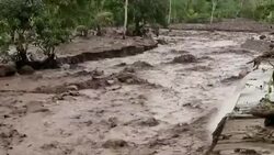 Continuous rains caus mud with volcanic material to slide down mountain Instructional Video