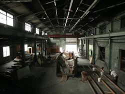 MS TU TD Volunteer group of people working in interior of rundown at vacant industrial warehouse building / Rutland, Vermont, United States    Stock Footage