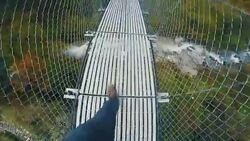 Walking over bridge Stock Footage