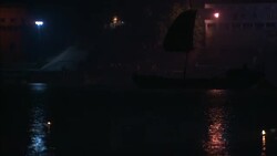 Boats and diyas float along a river during India's Diwali celebration. Stock Footage