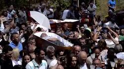 CLEAN : Spain: people carried in coffins for a festival News Clip