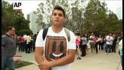 Thousands of young illegal immigrants lined up hoping for the right to work legally in America without being deported. The Obama administration's Deferred Action for Childhood Arrivals would give work permits to more than 1 million young illegal immigrants. News Clip