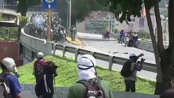 CLEAN : Clashes at protests in the streets of Caracas News Clip
