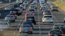 US Highway 101 in Marin County California at evening rush hour.  Photograph shows the rush hour traffic heading both north and south along a major interstate artery just north of San Francisco, California. Stock Footage